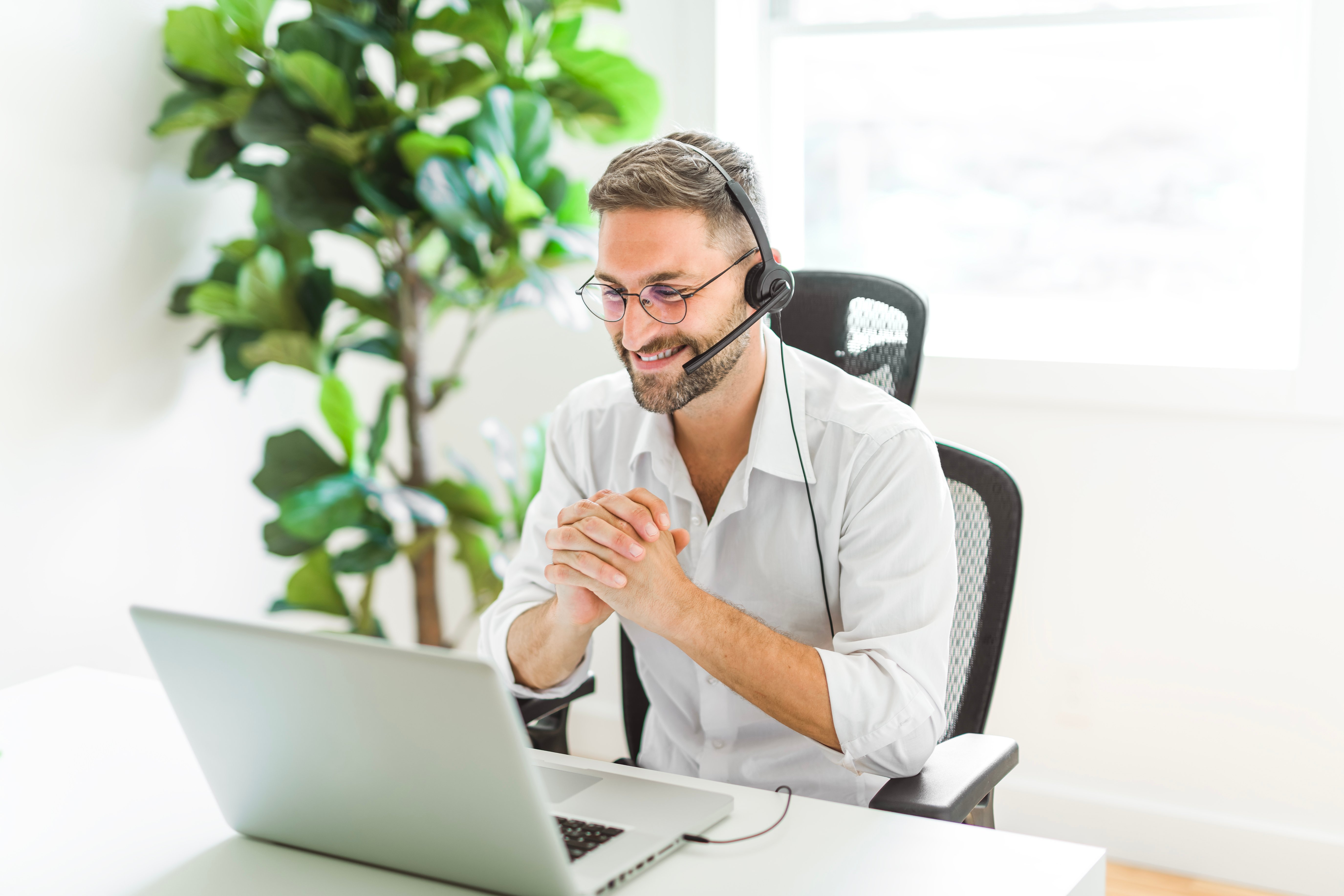 Mature analyst man using laptop computer in office